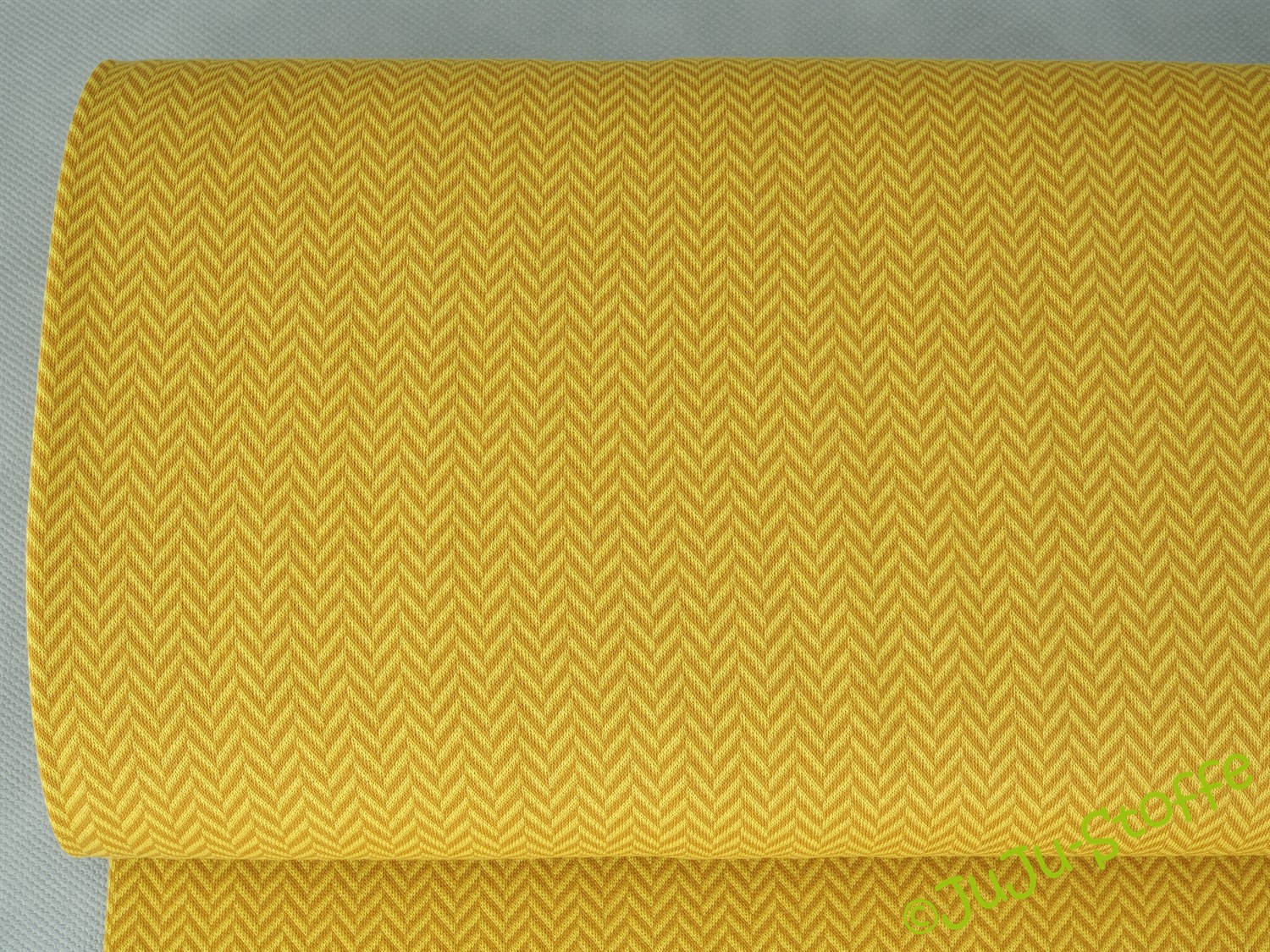Jacquard Jersey Fischgrät messing